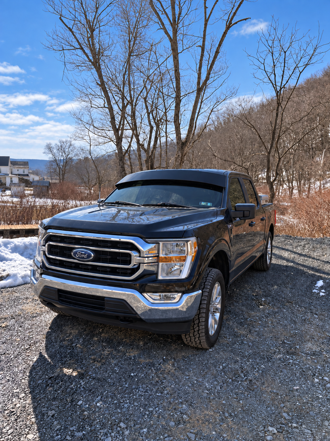 2017–2026 Ford F-150 with smooth TRUBLU straight drop visor, front-left view