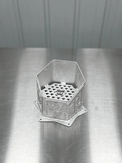 Diamond-Edition CNC aluminum hood-stack tip showing the geometric panels and TBF mesh