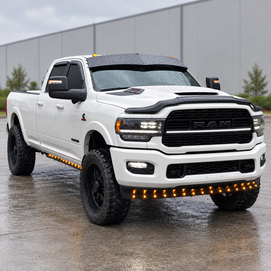 White 5th Gen Ram 2500 with a black TRUBLU V drop visor installed