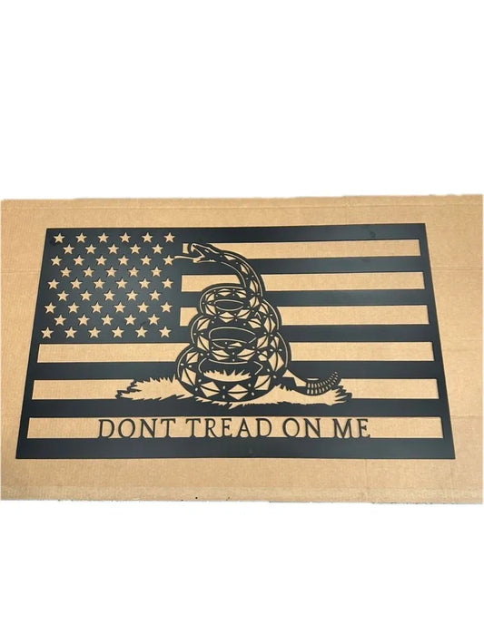 Metal wall art with American flag, coiled rattlesnake, and 'Don't Tread On Me' text.
