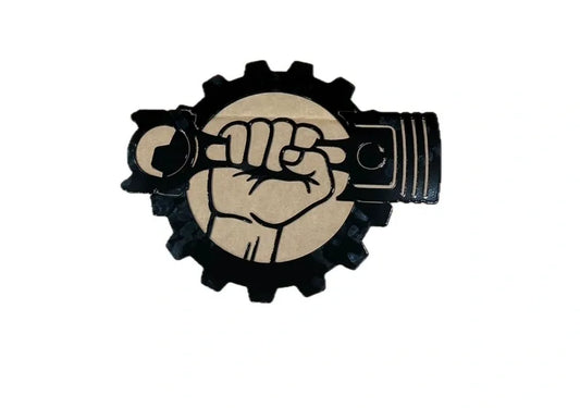 Gear-style sign with a hand holding a wrench and piston, mechanical workshop symbol